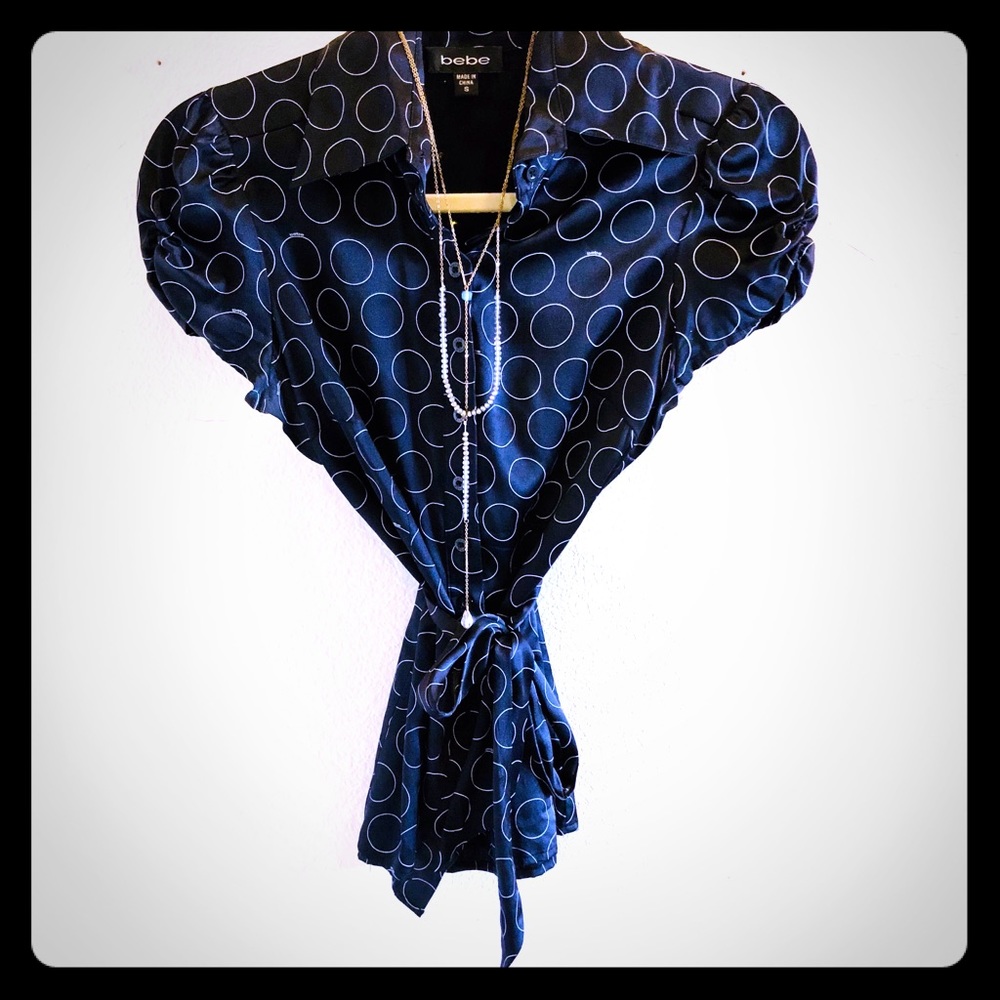 BeBe Silk top with tie waist. LadyBosssss